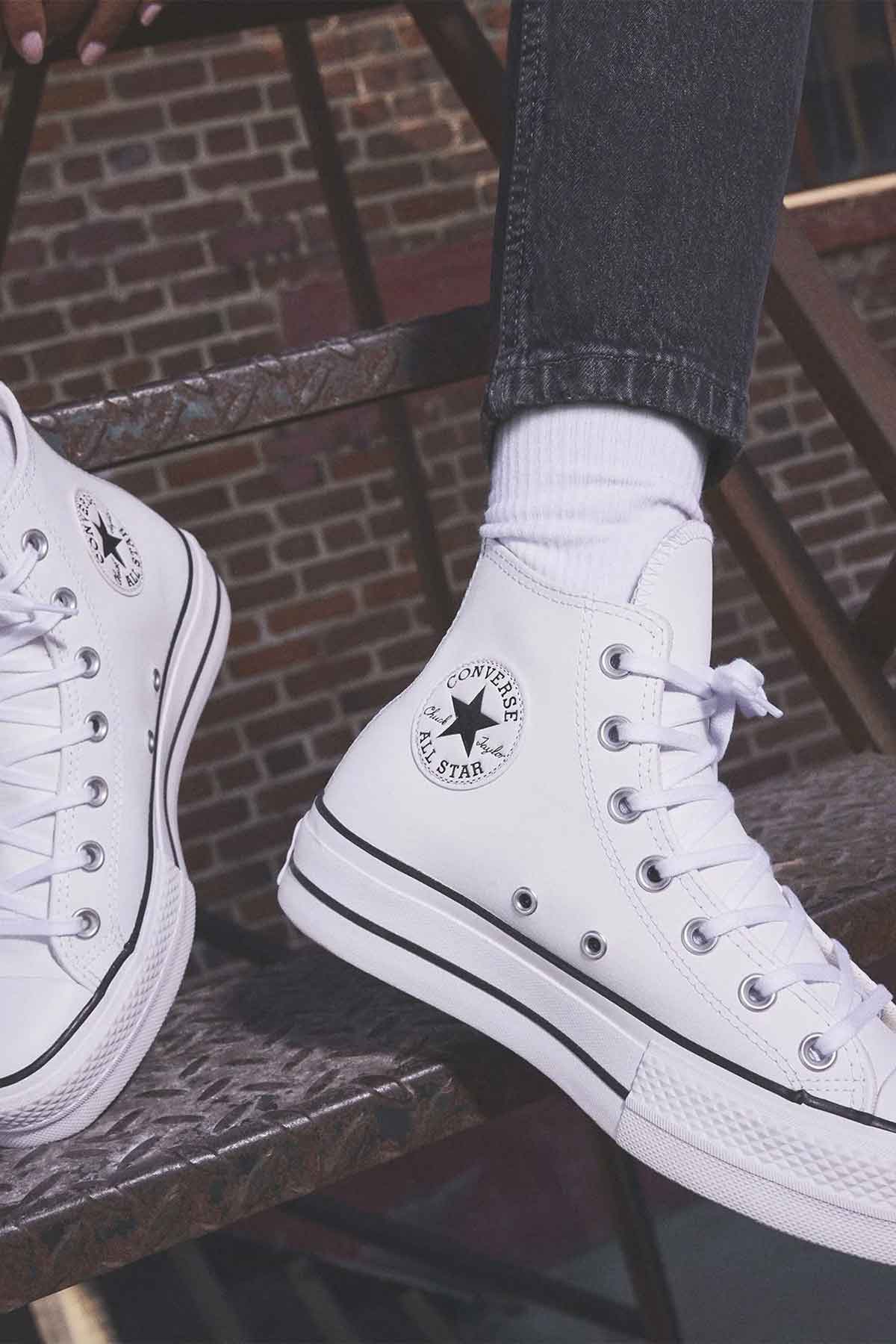 Converse All Star נעלי סניקרס אולסטאר פלטפורמה עור גבוהות בצבע לבן לנשים