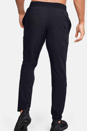 Under Armour  מכנסי דגמ"ח ארוכים Unstopabble בצבע שחור לגברים